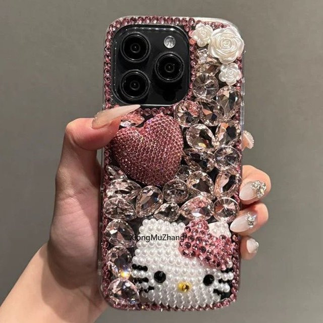 Sanrio Hello Kitty Handyhülle mit 3D Diamant Schleife in Rosa für iPhone Modelle - Bild 1