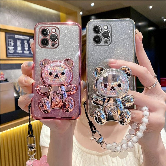 Apple Handyhülle mit Blumenarmband und Bär-Motiv als Standcover für iPhone 11 12 13 14 15 Pro Max Mini Plus X XR XS in Silber - Bild 1