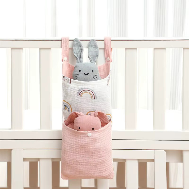 Multifunktionale Aufbewahrungstasche aus Baumwolle für Babybetten und Kinderwagen in Pink - Bild 1
