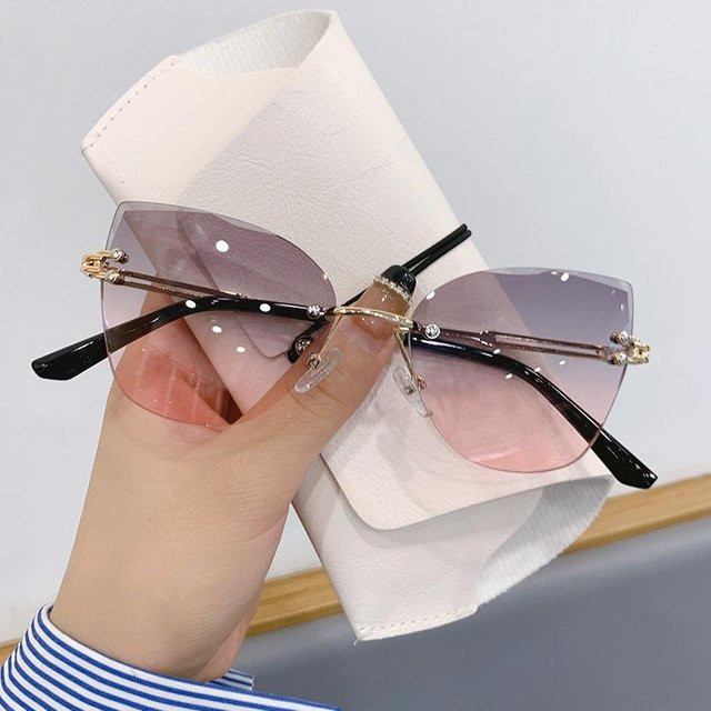 Sonnenbrille Cat-Eye, randlos, pink, Unisex - Bild 1