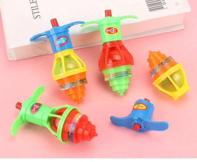 Kidsly Leuchtende Kreisel, Kreisel-Auswurfspielzeug, 4-teiliges Set - Bild 1