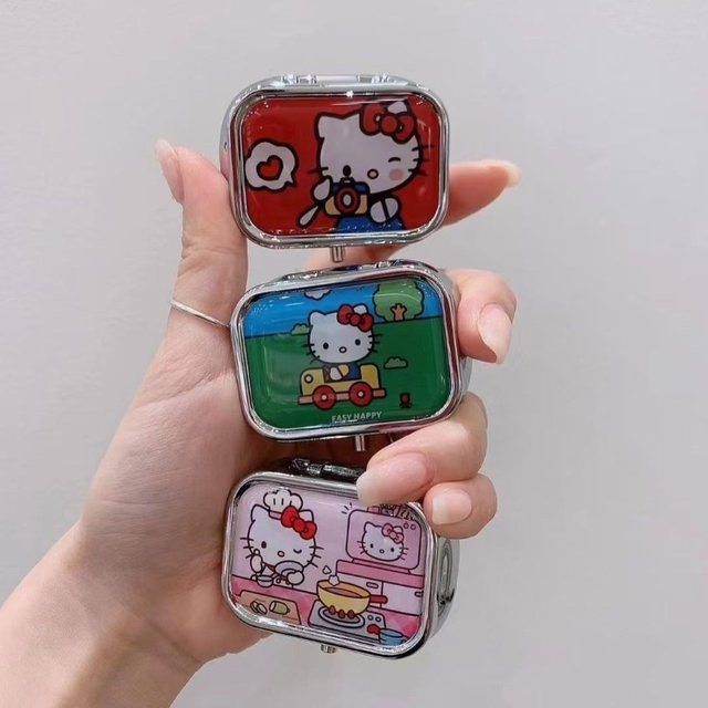 Hello Kitty Metall-Aufbewahrungsbox in Multicolour als niedlicher Pillen-Organizer und Schmuckschatulle im Kawaii-Design - Bild 1
