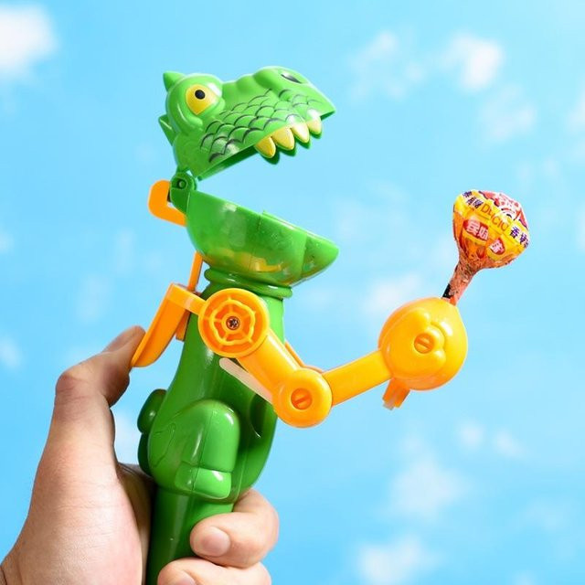 YJSTY Dinosaurier Lutscher Spielzeug, Katze Artefakt, Teleskopischer Süßigkeiten Essroboter - Bild 1