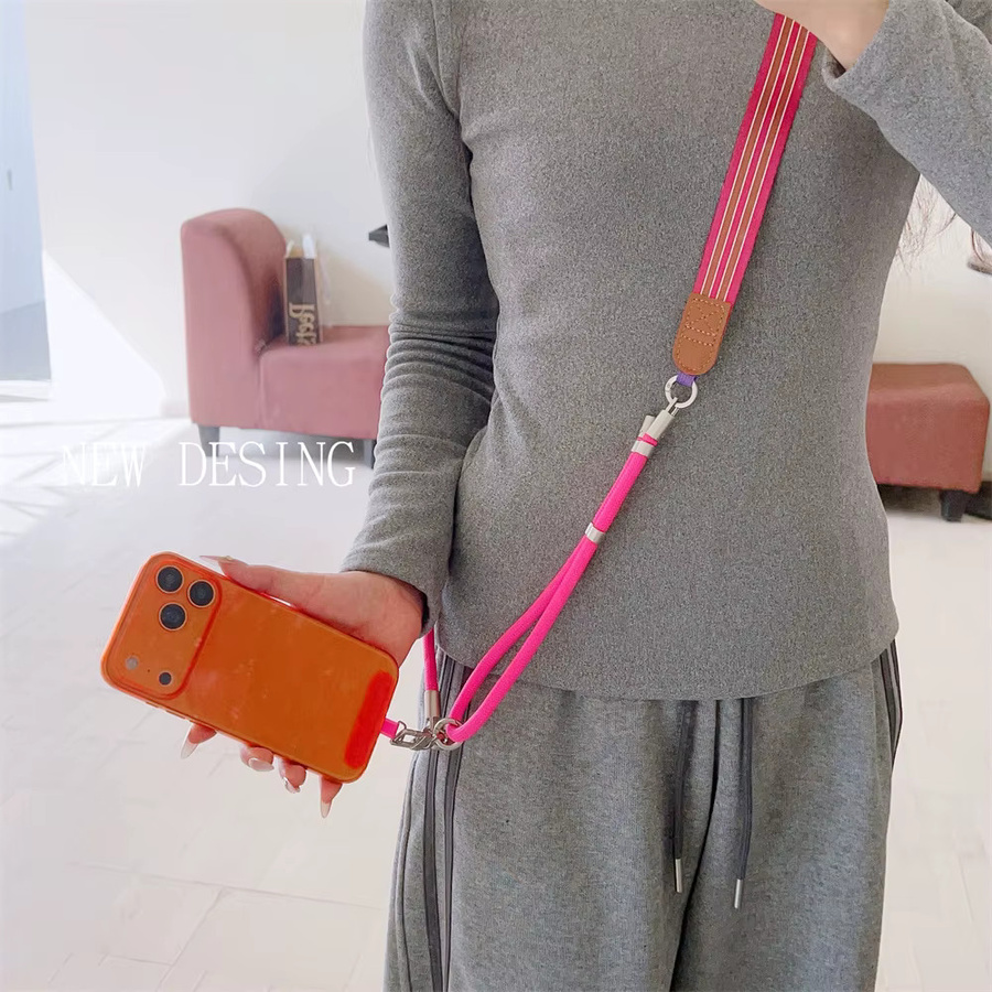 Crossbody-Handyhülle von lolozzx mit buntem Retro-Muster und verstellbarem Umhängeband sowie Patch-Schutzabdeckung - Bild 1