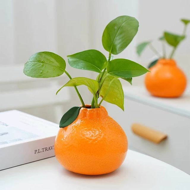 Dekorative Keramikvase in Fruchtform in Orange für deine Tischdekoration - Bild 1