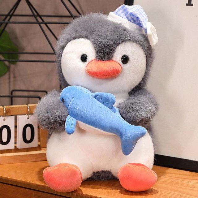 Kidsly Pinguin Umarmung Fisch, Plüschtier, 35cm, ab 14 Jahre - Bild 1