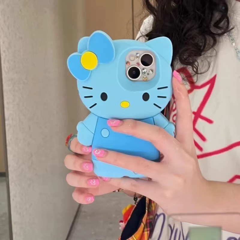 Sanrio Hello Kitty Handyhülle aus weichem Silikon in Blau für iPhone 16 15 14 13 12 Pro Max mit 3D Cartoon Design und Stoßschutz - Bild 1