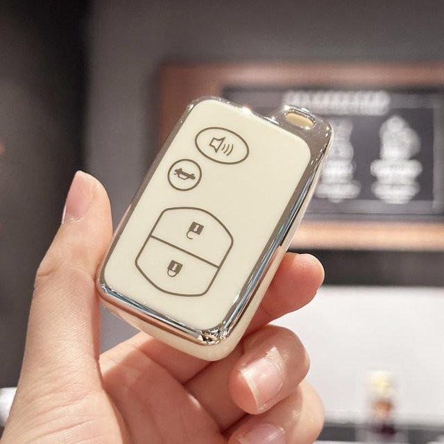Schlüsselanhänger-Abdeckung und Autoschlüsseletui für Toyota Land Cruiser Prado Avensis IQ Corolla Prius Highlander Yaris in Weiß und Gold - Bild 1