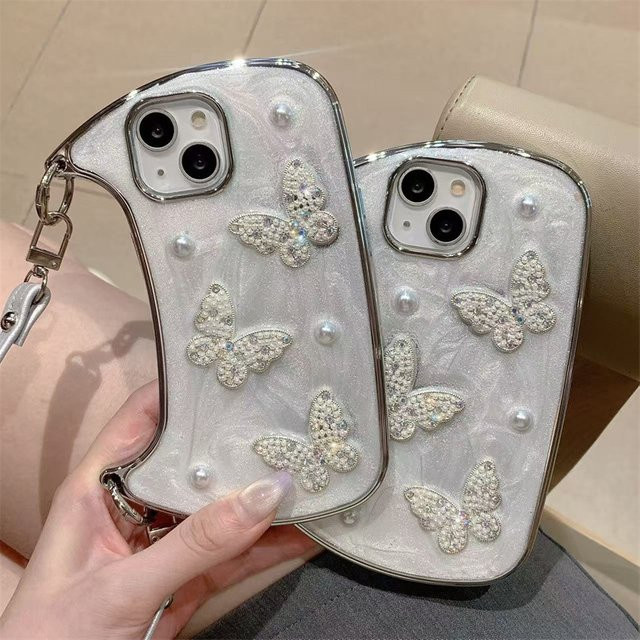 MUQGEW Handyhülle mit 3D-Glitzer-Perlen und Schmetterlings-Design für iPhone, inklusive Lederband und stoßfestem Schutz, Farbe: Weiß - Bild 1