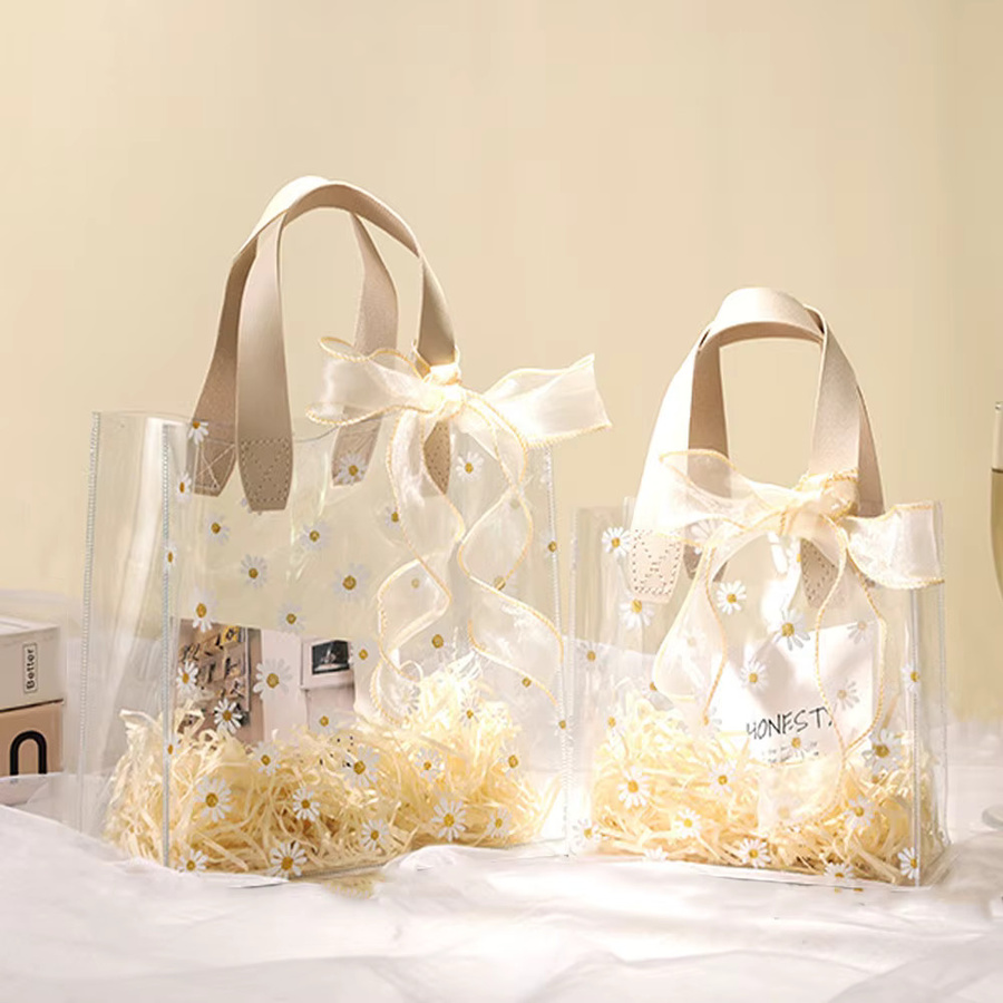 2er-Set transparente PVC-Geschenktüten mit Gänseblümchen-Design und Bändern für Hochzeiten und Festivals in Beige - Bild 1