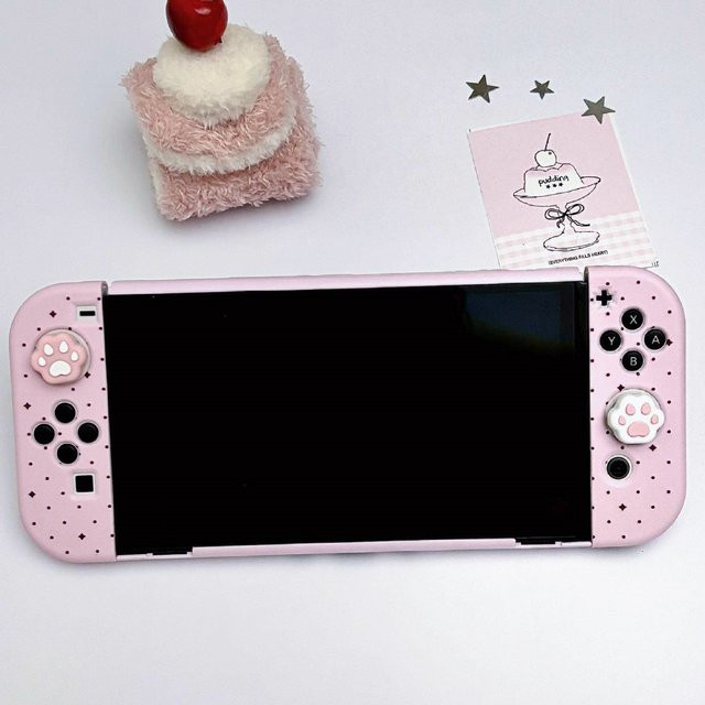 Bandai Cartoon Schutzhülle für Nintendo Switch OLED und Switch Lite, rosa gepunktet mit Katzenpfoten-Daumengriffen - Bild 1