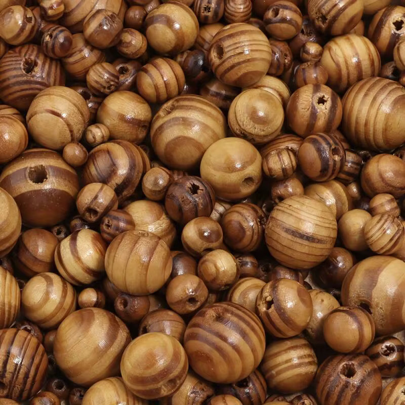 Kiefernholzperlen, rund, 6–18 mm, Unisex - Bild 4