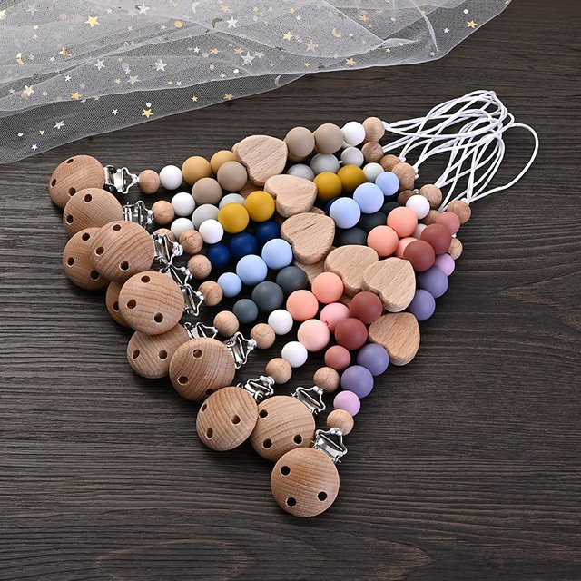 Schnuller Kette für Babys aus Buche und Silikon mit Herz- und Perlenform in Mehrfarbig - Bild 1