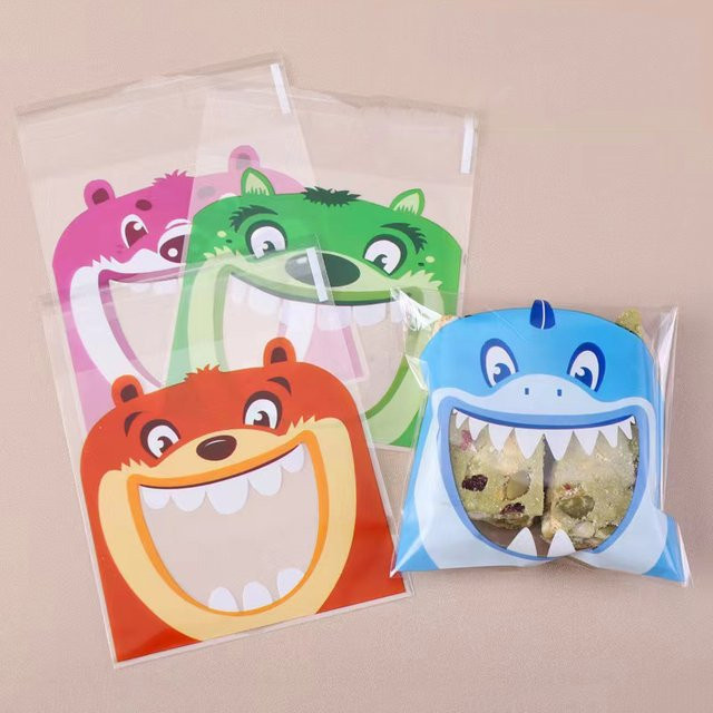 100 Stück bunte Monster Motiv Plastiktüten mit Selbstklebeverschluss für Süßigkeiten und Geschenke bei Hochzeiten oder Geburtstagen - Bild 1
