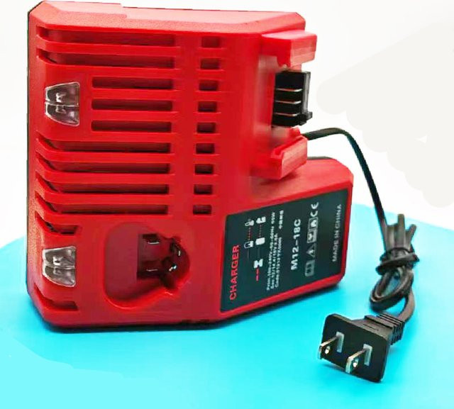 Milwaukee M12-18C Ladegerät für 12V, 14,4V und 18V Lithium-Ionen Akkus in Rot - Bild 1
