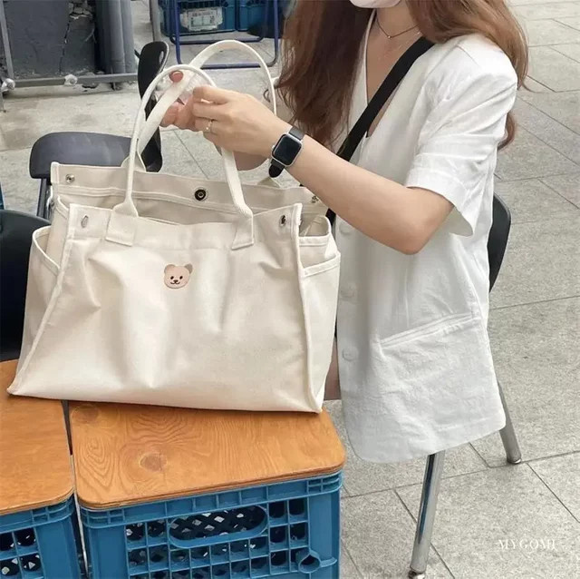 DANIVIVI Canvas Mama Tasche als Windel Organizer und Umhängetasche für Neugeborene in Weiß - Bild 1