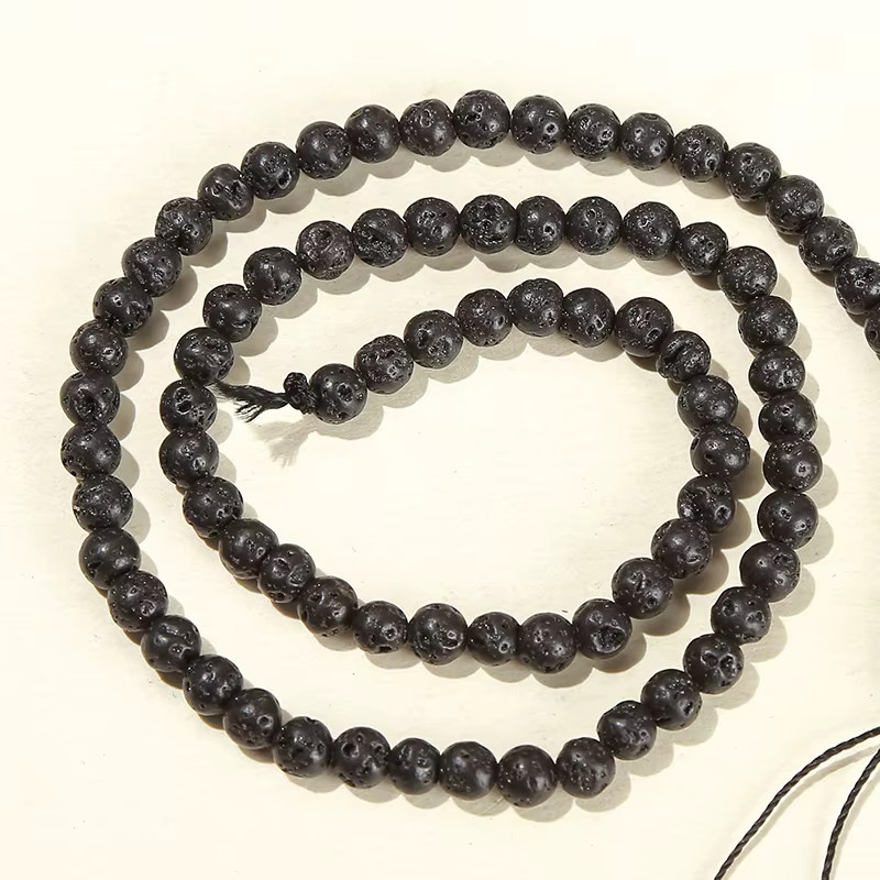 Distanzperle Lavastein, schwarz, rund, 4-12 mm, 15 Zoll - Bild 4
