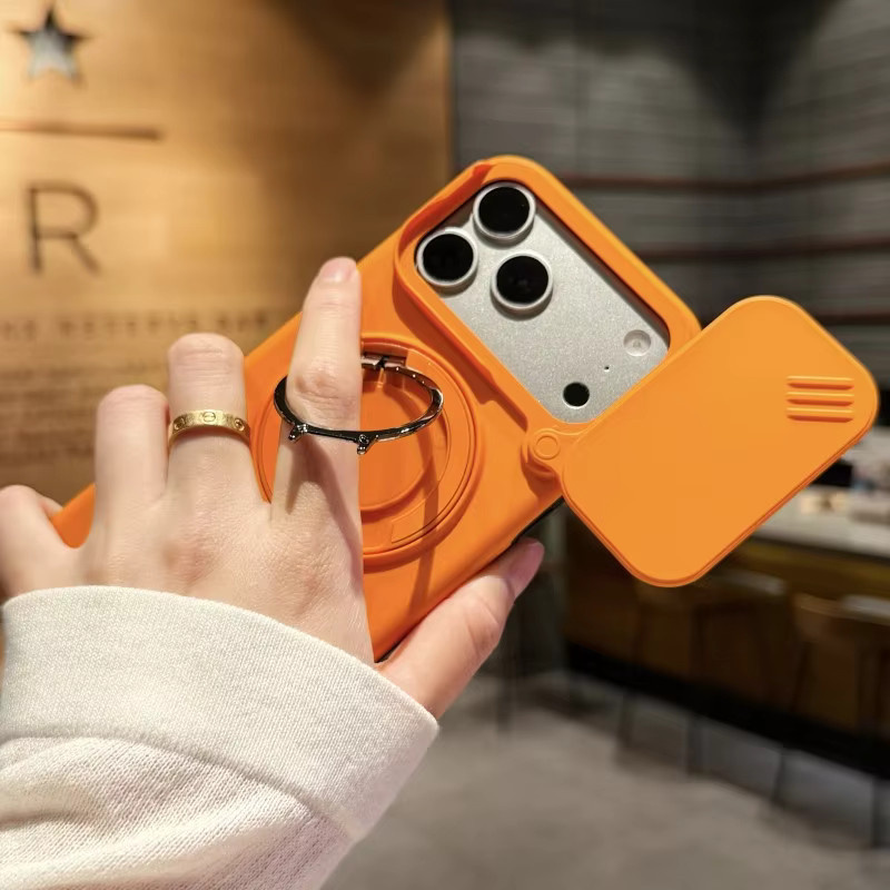 Eurynome Kamera-Schiebehülle für iPhone 12 bis 17 Pro Max, stoßfeste Panzerhülle mit magnetischem Ringhalter aus Hartplastik und TPU, Farben: Schwarz und Orange - Bild 3