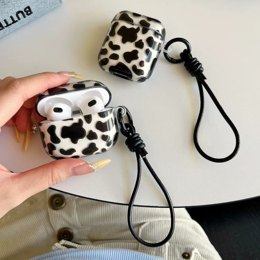 Leder-Lanyard Kopfhörerhülle mit Kuhmuster für Apple AirPods 1, 2, 3, 4 und Pro in Schwarz-Weiß - Bild 3