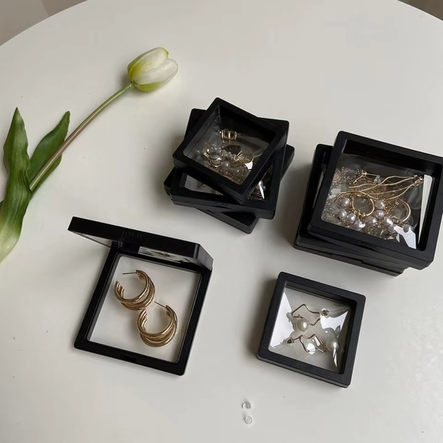 Clearview 100 Stück 3D-Schwimmvitrinen aus Acryl, transparente staubdichte Schmuck-Aufbewahrungsboxen mit elastischer Folie zum Aufhängen - Bild 2