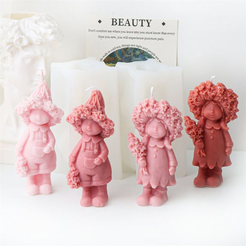 Ästhetische 3D Skulptur aus Kunstharz mit Blumenmotiv und Figuren in Rosa als dekorative Tischdekoration - Bild 1