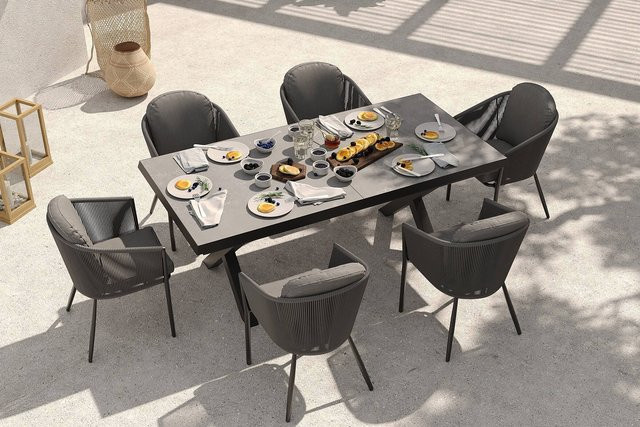 OUTFLEXX Tavio Garten-Essgruppe aus Aluminium, Rope und Steinimitat in Schwarz und Anthrazit mit ausziehbarer Tafel und 6 Diningsesseln - Bild 1