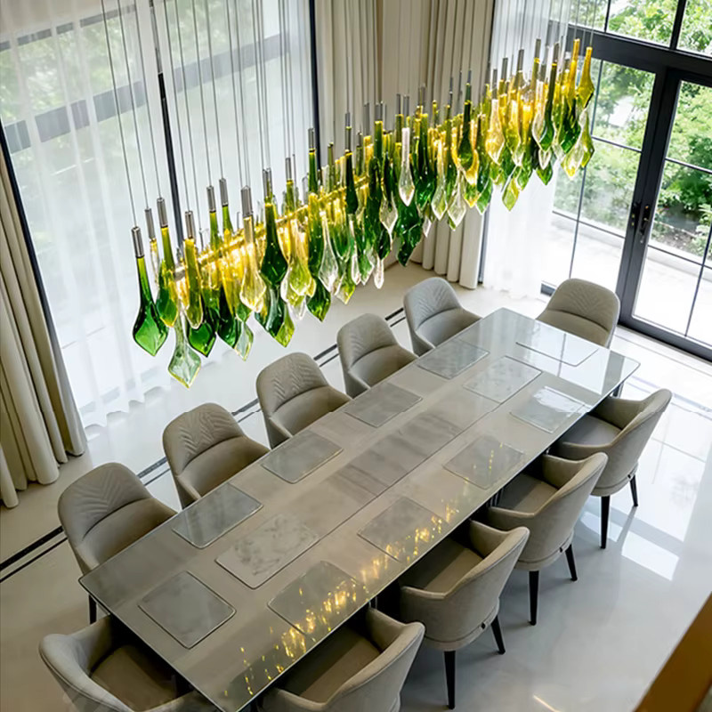 Moderne dimmbare Pendelleuchte aus grünem Glas mit silberner Hardware für eine stilvolle Deckenbeleuchtung - Bild 2