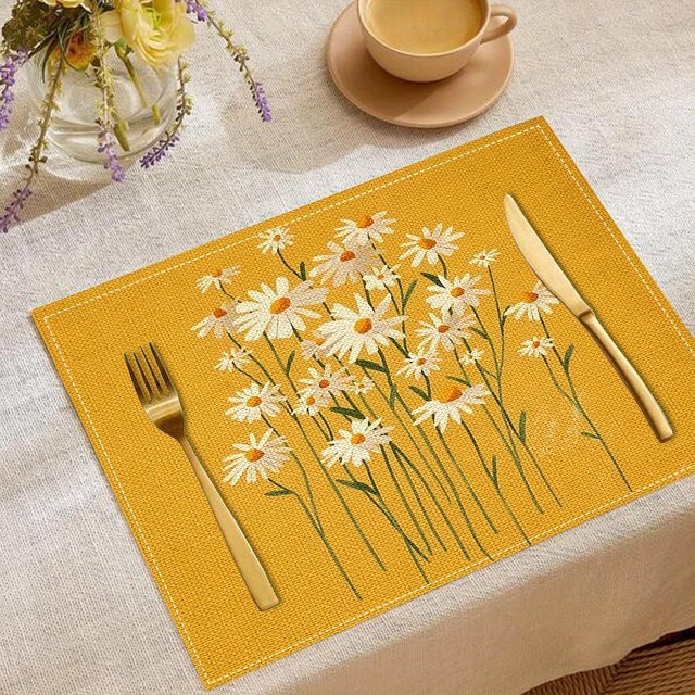VIKAMA 4-teiliges Tischset Set mit Gänseblümchen-Design in Gelb, wasserdicht und hitzebeständig - Bild 1