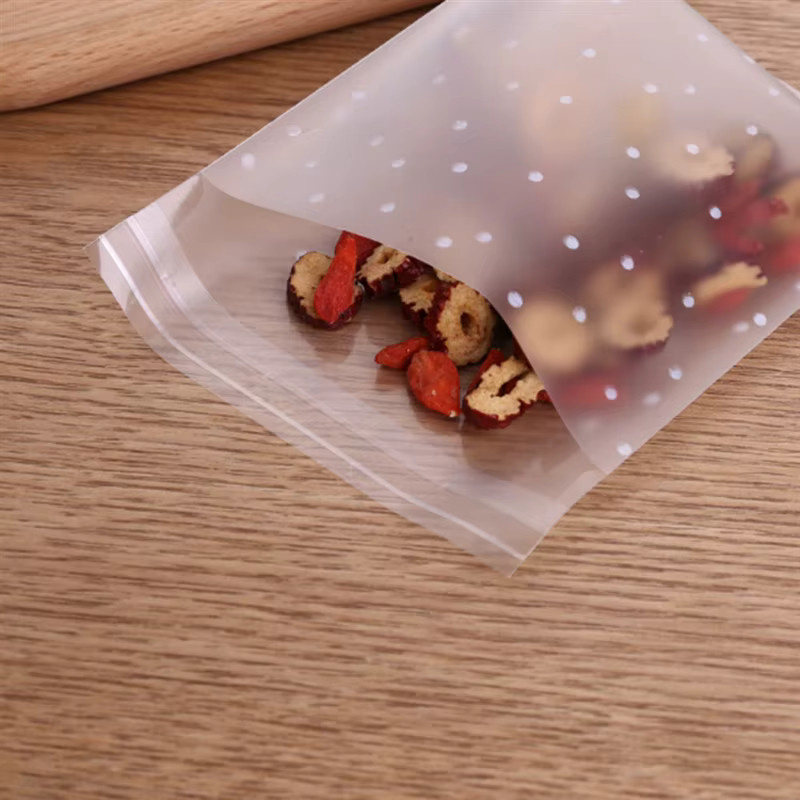 100 Stück transparente Cellophan-Plastiktüten mit gepunktetem Design und selbstklebendem Verschluss zum Verpacken von Süßigkeiten, Keksen und Geschenken - Bild 4