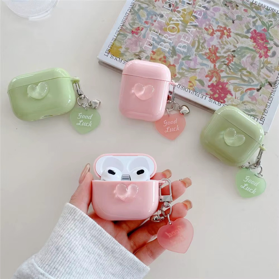 Niedrige Silikon-Schutzhülle mit Herz-Cartoon-Design und Anhänger für Apple AirPods 4 3 2 1 Pro in Pink oder Grün - Bild 1