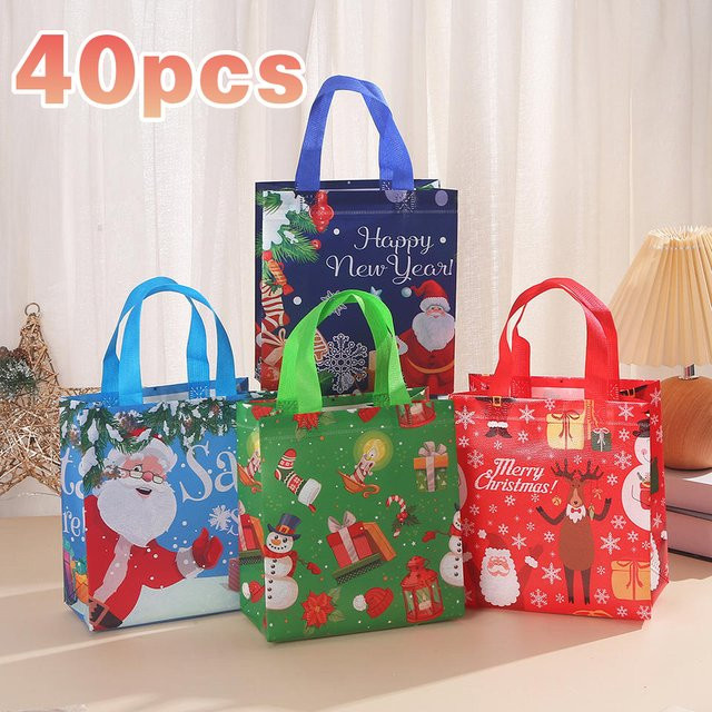 40 Stück Weihnachts Geschenktüten aus wasserdichtem Vlies mit Santa, Elk und Schneeflocken Motiv in Blau - Bild 1