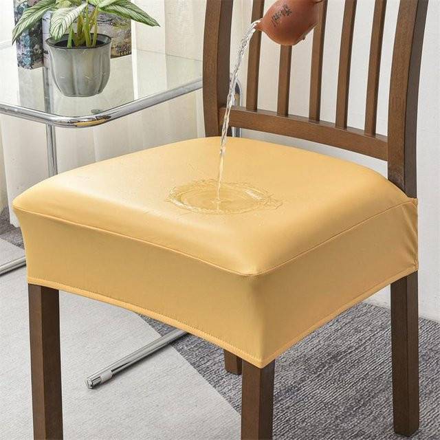 Wasserdichter und schmutzabweisender Stretch-Stuhlbezug aus PU-Kunstleder in Gelb für Esszimmer und Büro - Bild 1