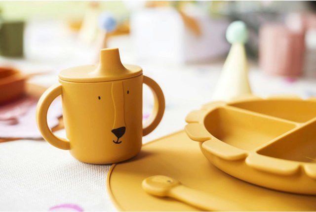 Trixie Trinklernbecher aus Silikon mit Soft-Spout in Orange und Gelb - Bild 1