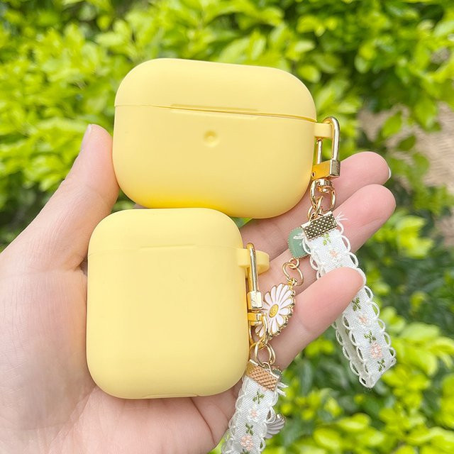 Silikonhülle für Apple AirPods 1. und 2. Generation in Blau und Gelb - Bild 1
