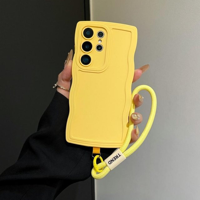 Moderne TPU Handyhülle mit Wellen-Design und Handgelenkband für Samsung Galaxy S25 Ultra S24 S23 S22 Plus A16 A56 A54 A55 A25 5G in Gelb - Bild 1