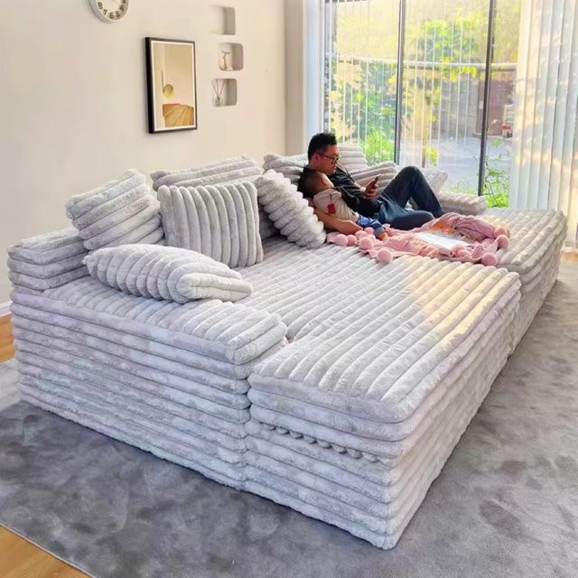 MDNG Kingsize Designsofa in Beige mit Stoffbezug und passenden Kissen für dein Wohnzimmer - Bild 1