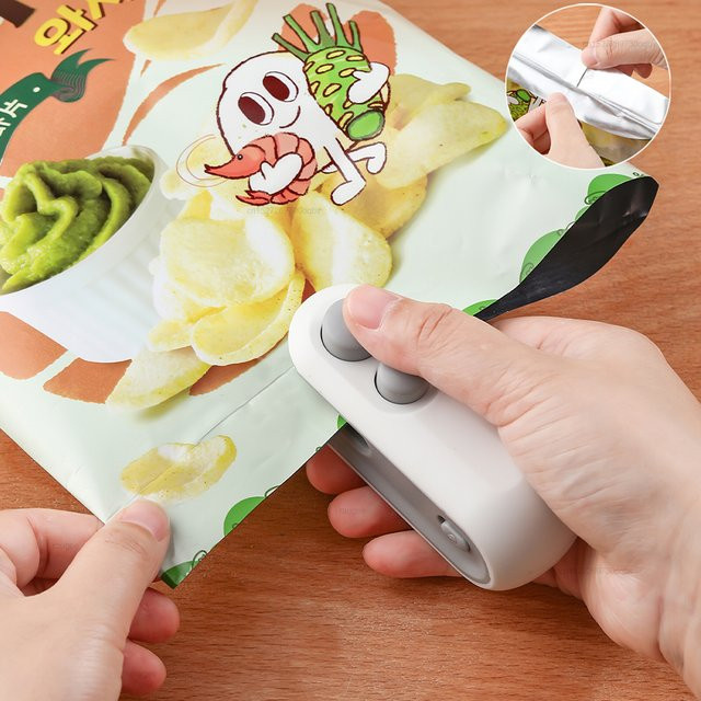 Mini Wärmebeutel Versiegelungsmaschine von raugee, tragbares Handheld Heißsiegelgerät zur Lebensmittelverpackung in Blau und Weiß - Bild 1