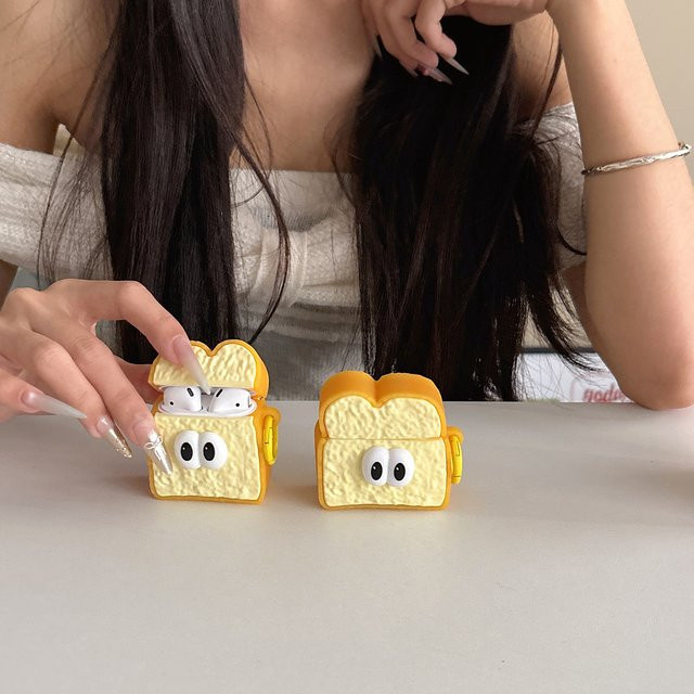 Big Eye Toast Schutzhülle für Apple AirPods Pro 1 2 3 und AirPods 4 in Gelb, stoßfest und staubdicht - Bild 1