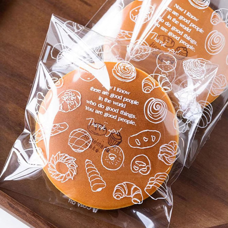 100 Stück transparente Lebensmittelverpackungstaschen mit süßem Muster für Brot, Toast und Kekse zum Selbstverschließen - Bild 3