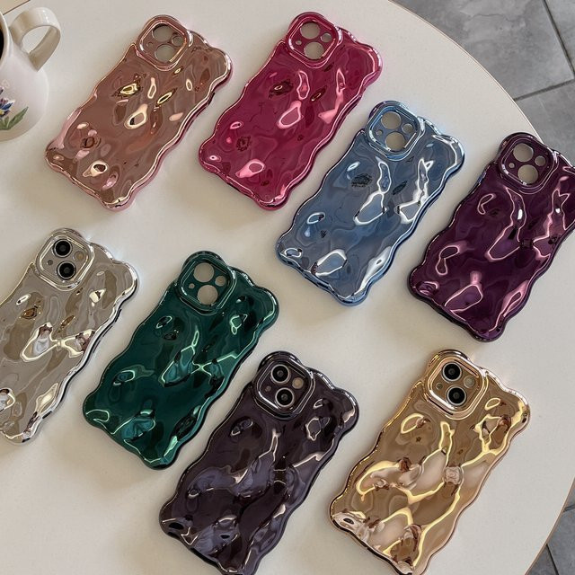 Silberne iPhone Hülle mit luxuriöser gewellter 3D-Meteorit-Textur für iPhone 11 bis iPhone 15 Pro Max mit Anti-Fall-Schutz und glänzender Oberfläche - Bild 1