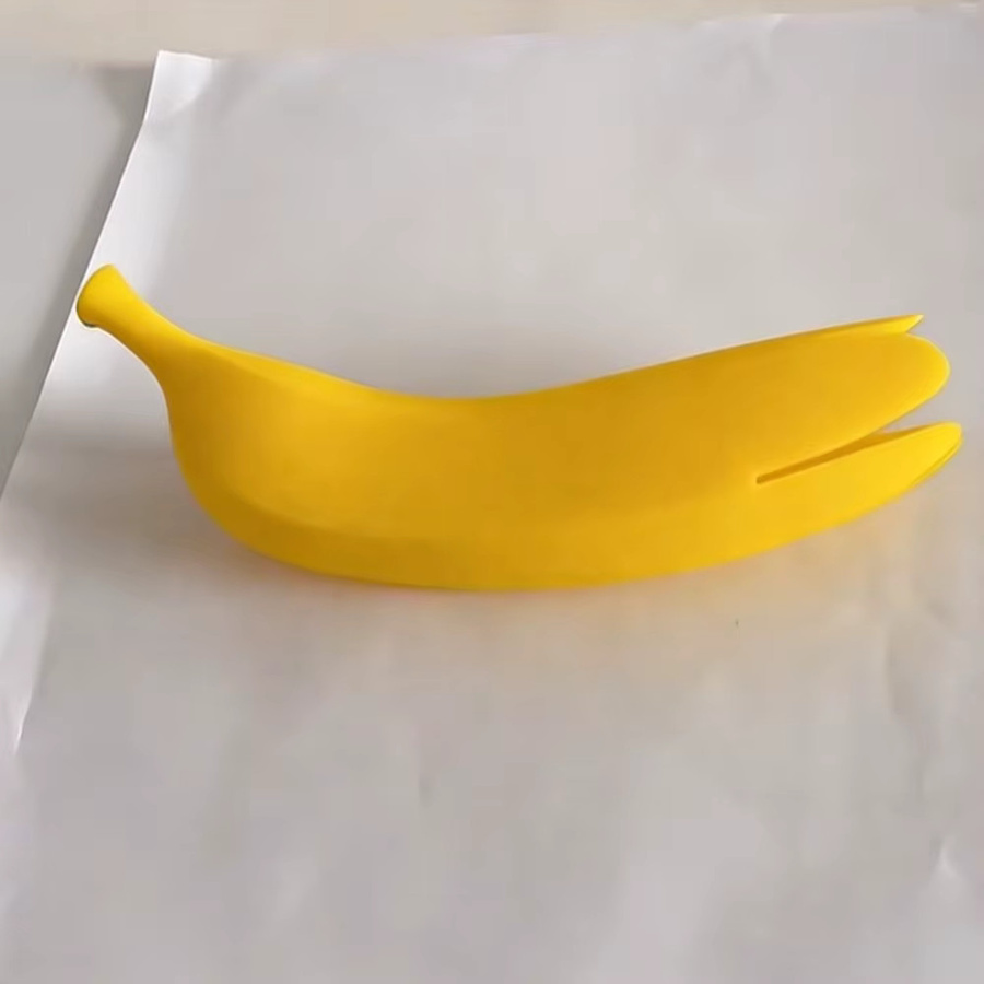 Gelbe Küchenhandschuhe in Bananenform aus Silikon als Isolierhülle und Topfgriff-Schutz gegen Verbrühungen - Bild 2