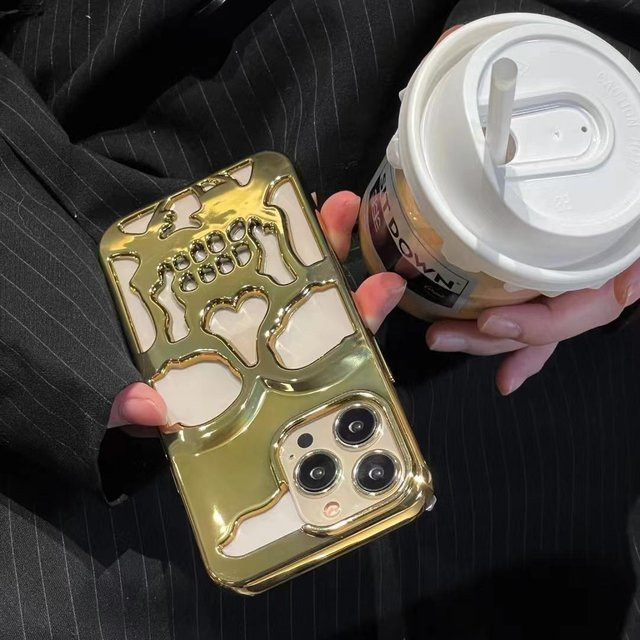 Stoßfeste iPhone Hülle mit Luxus-Skelett-Schädel-Design in Gold für Apple iPhone 16 bis 15 Pro Max mit Vollschutz für Kamera und Rückseite - Bild 1