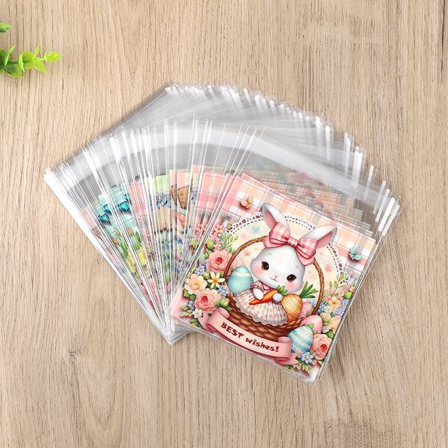100 Stück ZQCXLD Oster-Geschenkverpackungstüten aus Kunststoff mit Hasen- und Eier-Motiv in Mehrfarbig für Kinder und Ostern-Partys - Bild 1