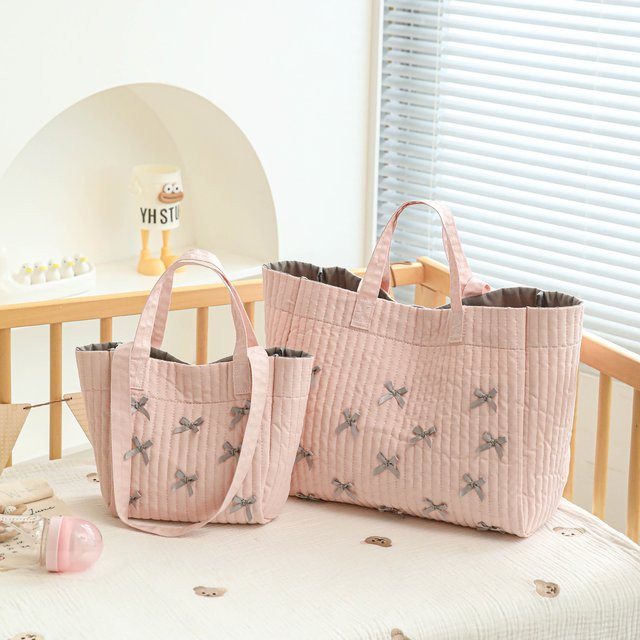 Multifunktionale Wickeltasche von movokbaby als Hand- und Schultertasche in Pink - Bild 1