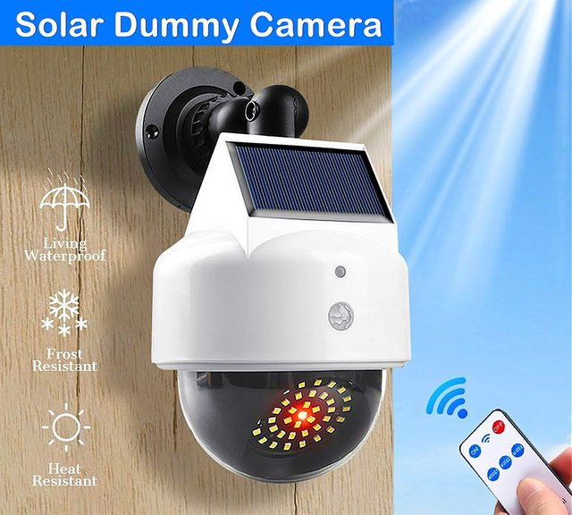 UCYBO Dummy Kamera Solarbetriebene drahtlose CCTV Videoüberwachungskamera mit LED-Licht und Bewegungssensor in Weiß - Bild 1