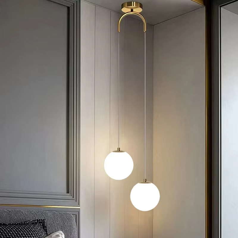 Moderne Glas-Pendelleuchte Ramalho in Transparent mit weißem Globe-Design für Wohnzimmer und Schlafzimmer - Bild 1