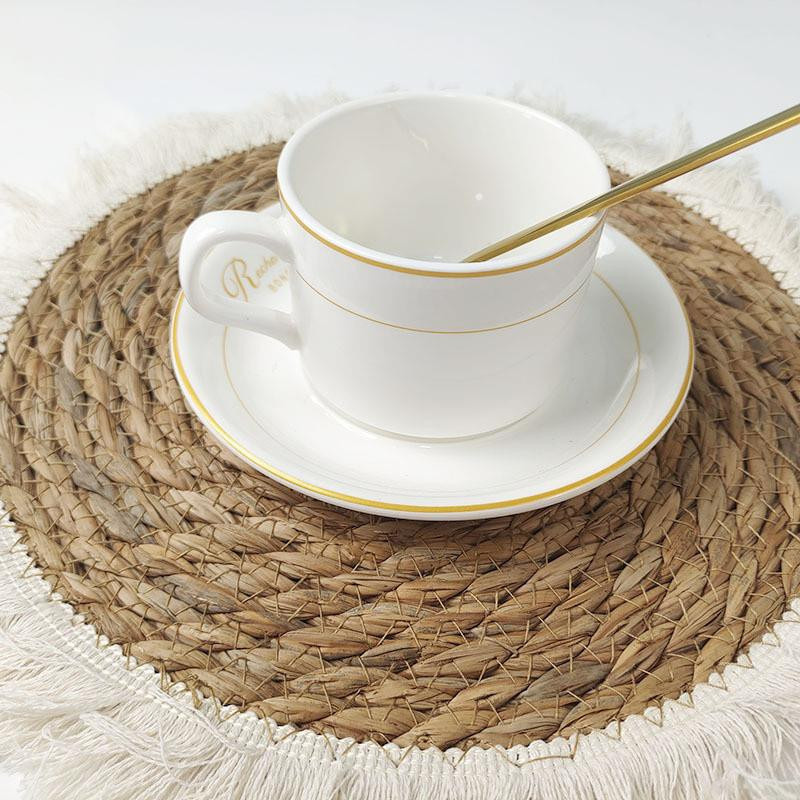 Set aus 14 runden Essensmatten aus handgefertigtem Rohrkolbengras im Bohemian Nordic Style mit Quastenrand in Beige - Bild 2