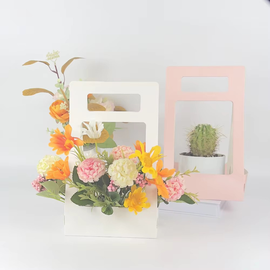 Elegante weiße Geschenkboxen aus Papier mit Griffen für Blumensträuße und Geschenke - Bild 1