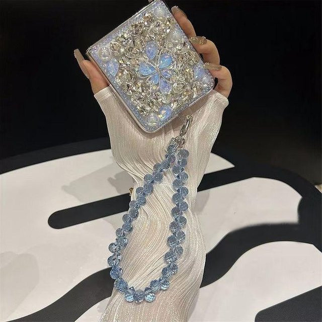 Elegante Handyhülle mit Kristallperlen und Schmetterlings-Edelsteinen für Samsung Galaxy Z Flip 6 in Blau - Bild 1