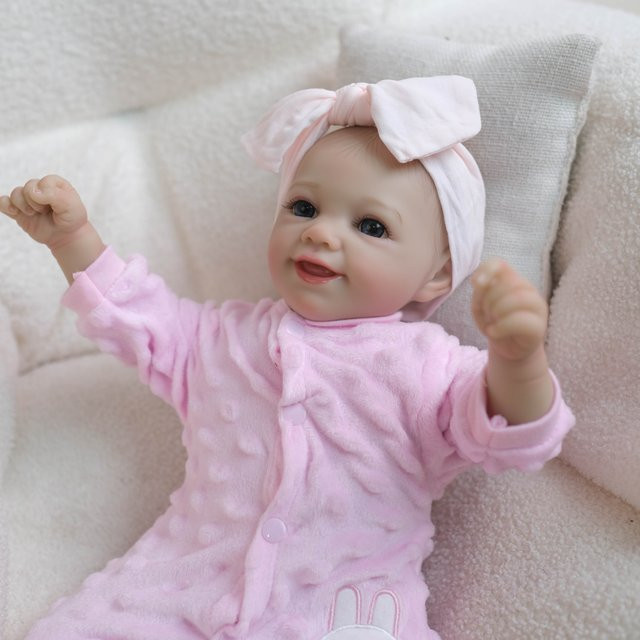 NPK Reborn-Puppe lächelndes Baby Mädchen in Schwarz und Rosa mit weichem Textilkörper und Ziehhaar als hochwertiges Sammlerstück - Bild 1